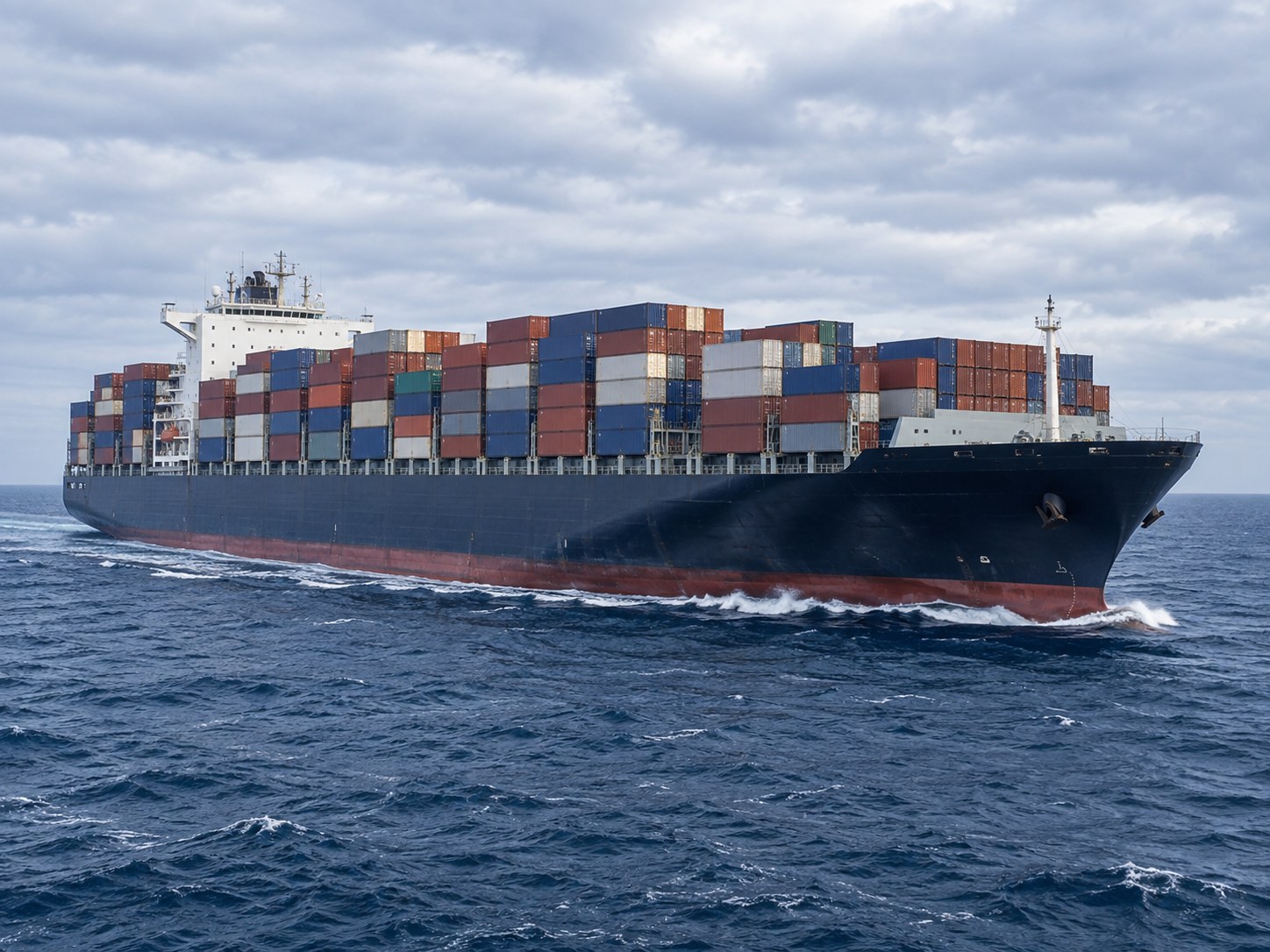 Illustrative large container ship carrying cargo at sea